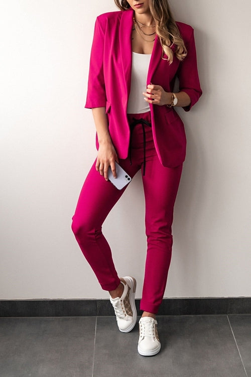 Conjunto de pantalones con blazer con mangas 3/4.