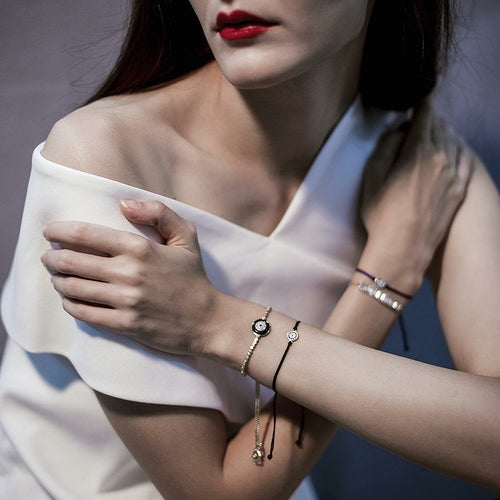 Pulsera de plata de ley con dijes de mal de ojo