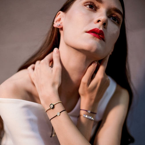 Pulsera de plata de ley con dijes de mal de ojo
