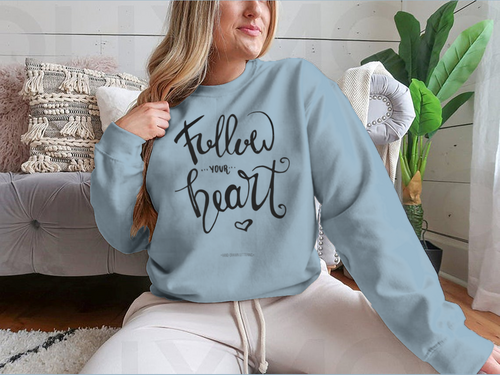 Follow Your Heart Sweatshirt. Hand-drawn ink calligraphy with a modern brush stroke and heart.