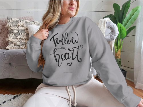 Follow Your Heart Sweatshirt. Hand-drawn ink calligraphy with a modern brush stroke and heart.