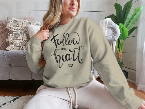 Follow Your Heart Sweatshirt. Hand-drawn ink calligraphy with a modern brush stroke and heart.